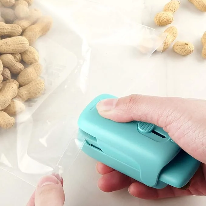 Seal your bags easily with this mini handheld heat vacuum sealer, an Amazon TikTok gadget for food storage.